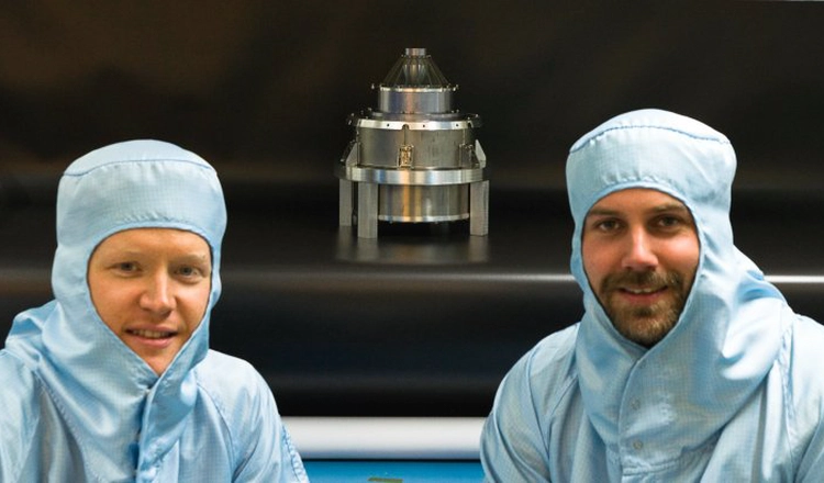 Rikard Ottemark and Joakim Peterson, both research engineers, in protective clothing, with JDC in the middle. Rikard Ottemark and Joakim Peterson, both research engineers, in protective clothing, with JDC in the middle.