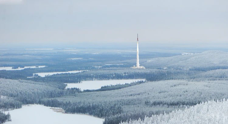 Esrange rocket launch as seen from distance, surrounded by a frosty winter landscape