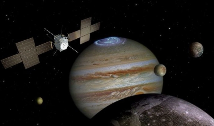 Illustration av JUICE i omloppsbana runt jupiter och dess månar