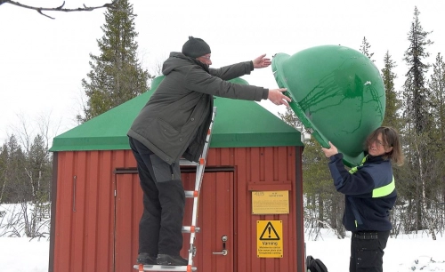 Engineers covering the station with the protective dome ahead of summer