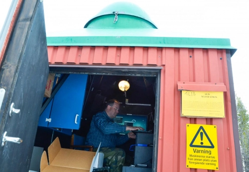 Urban Brändström maintaining the software inside the station